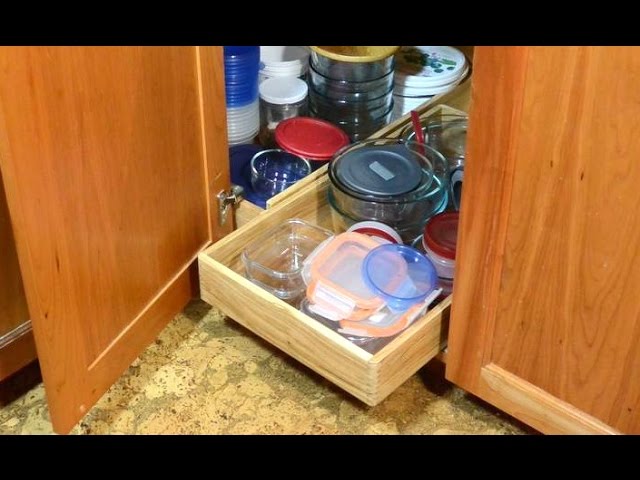 Sliding boxes to help organize a kitchen corner cabinet
